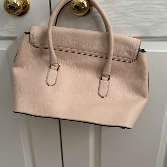 Kate Spade purse, barely used and great condition. The color is a peachy pink. - Picture 2 of 4